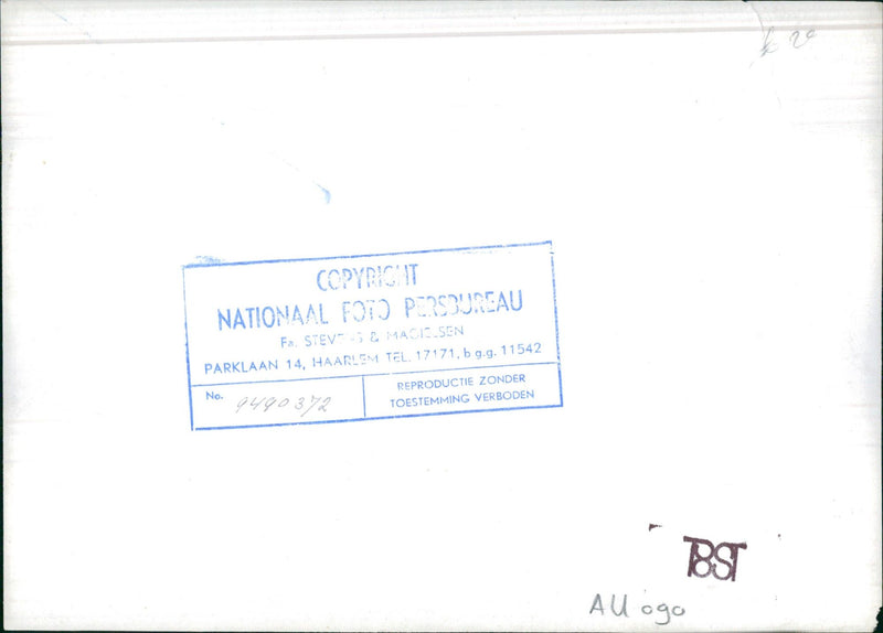 Men and woman in front of a classic car - Vintage Photograph