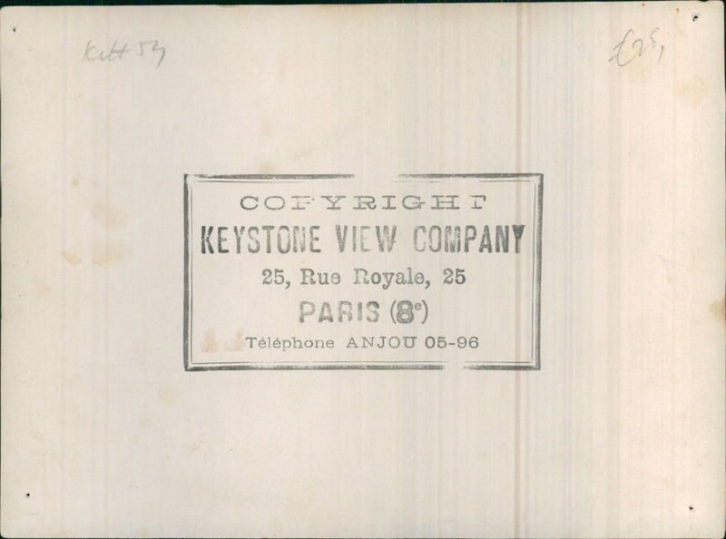 Vintage car driving on a wet road - Vintage Photograph