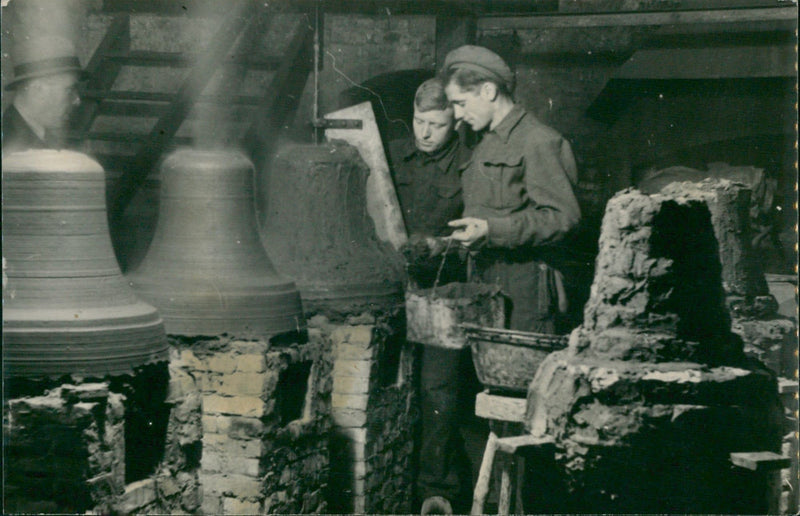 Men manufacturing clay bells - Vintage Photograph