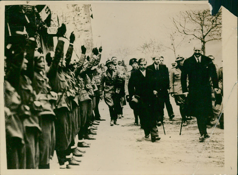 Soldiers saluting two men - Vintage Photograph