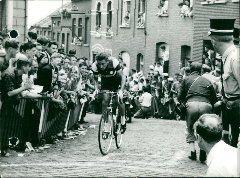 Anquetil crossing the "Mur de Grammont" in the Tour de France of 1957. - Vintage Photograph