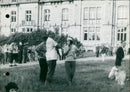 King Leopold and Princess Liliane watch firefighters out out the fire - Vintage Photograph