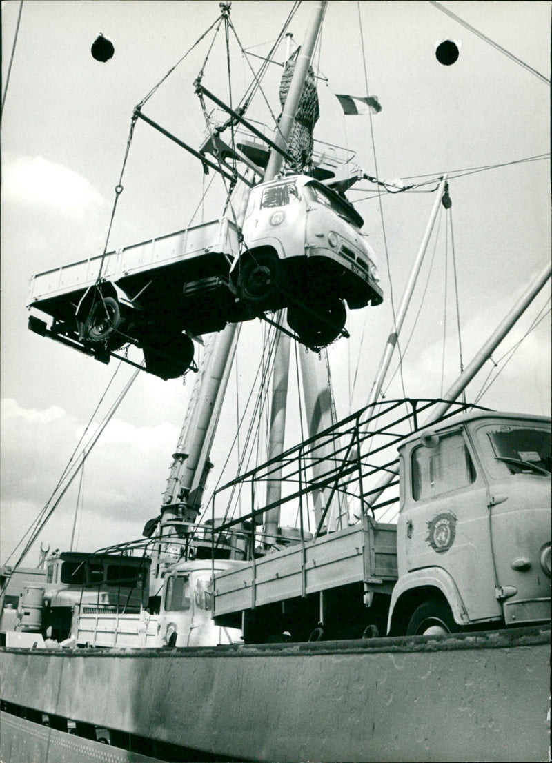 Trucks loaded onto ship - Vintage Photograph