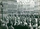 A parade of Grenadiers at the Grand Place in Brussels. - Vintage Photograph