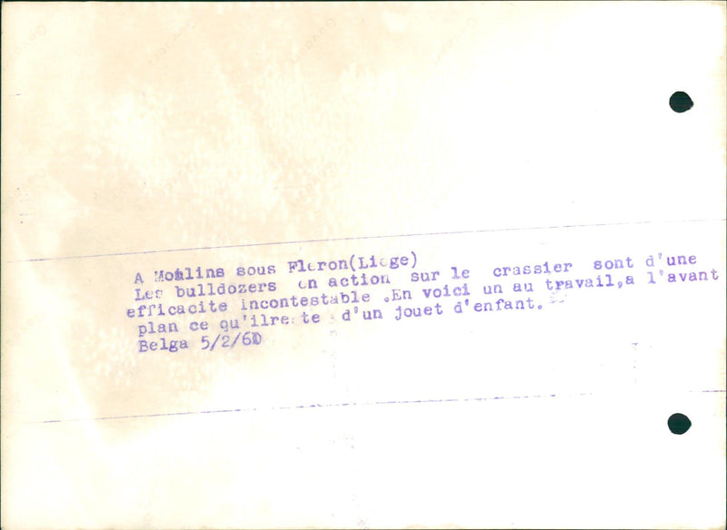 A bulldozer is clearing up mud - Vintage Photograph