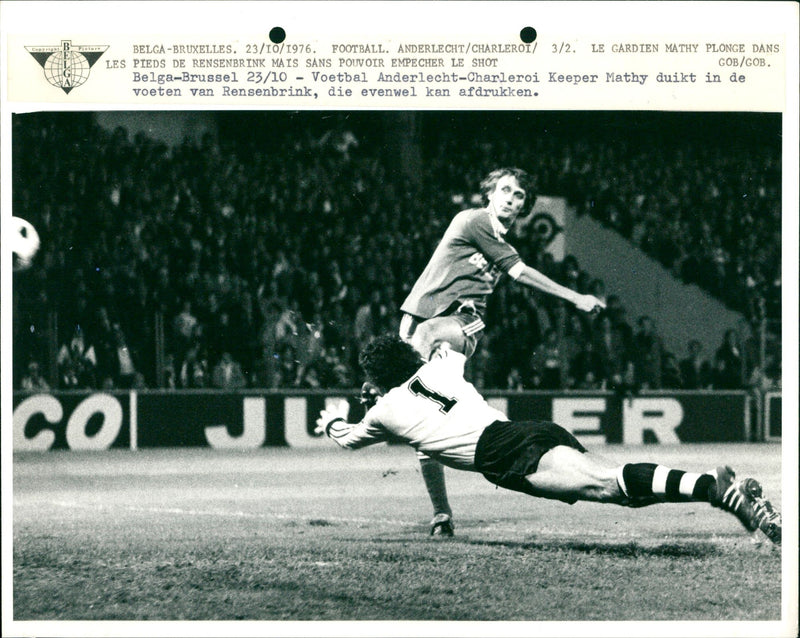 Goalie Mathy dives toward the feet of van Rensenbrink - Vintage Photograph