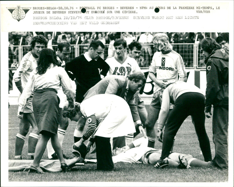 Stevens is carried off the field with a slight concussion - Vintage Photograph