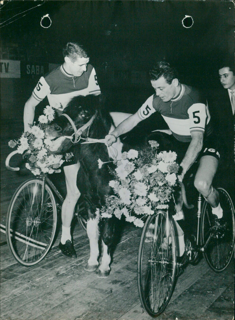 Peter Post and Reginald Arnold win a pony during cycling competition - Vintage Photograph