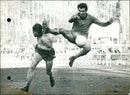 "Dangerous game" from Decock whose foot brushes Vandenberg's face - Vintage Photograph