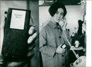 Japanese employees are warned of urgent call by this small device - Vintage Photograph