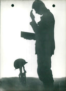 Soldier paying his respects at the grave of one of his comrades - Vintage Photograph
