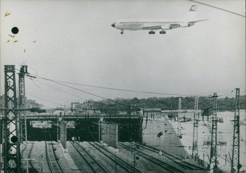 a concrete platform was built over the railroad tracks - Vintage Photograph