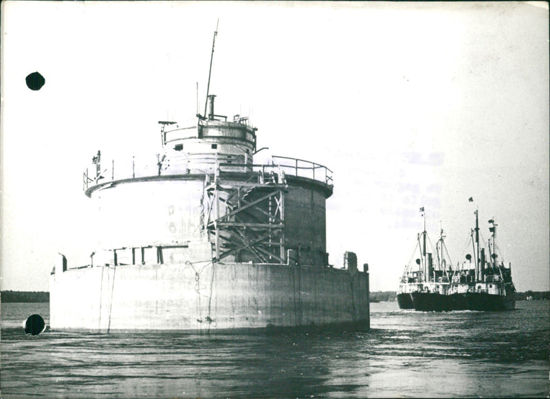 Lighthouse being towed by two ships - Vintage Photograph