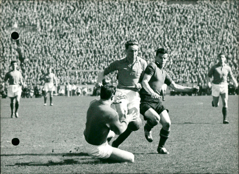 Dutch keeper catching the ball as Vliers approaches - Vintage Photograph