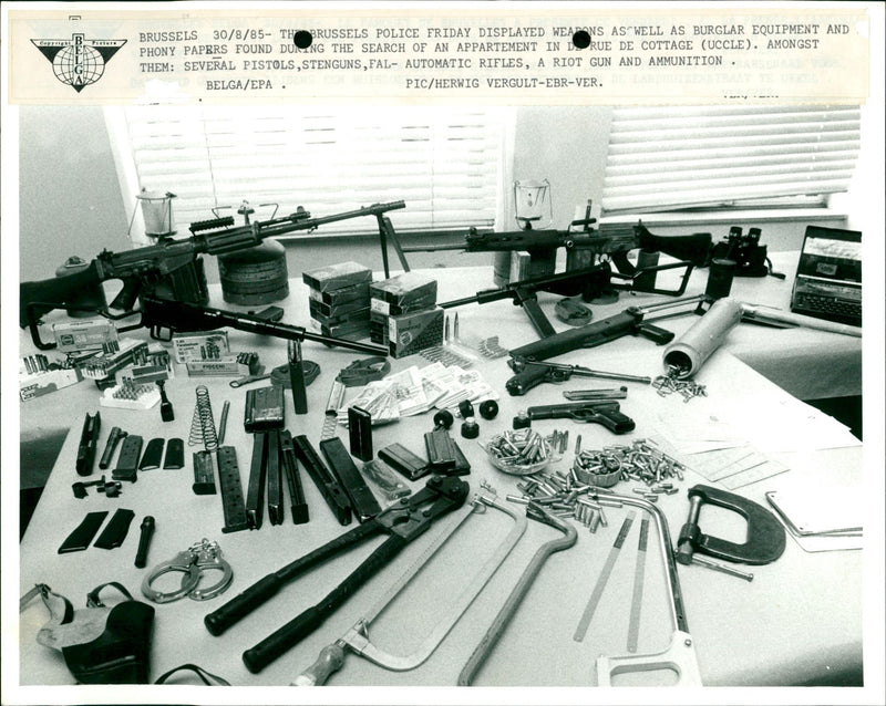 Weapons and burglar equipment found during a search. - Vintage Photograph