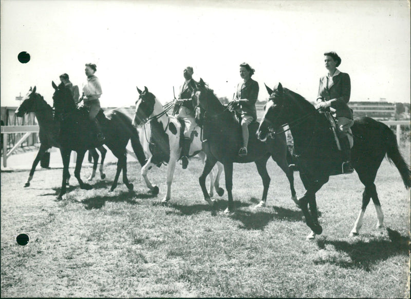 Queen Elisabeth is horse riding at Ascot Racecourse. - Vintage Photograph