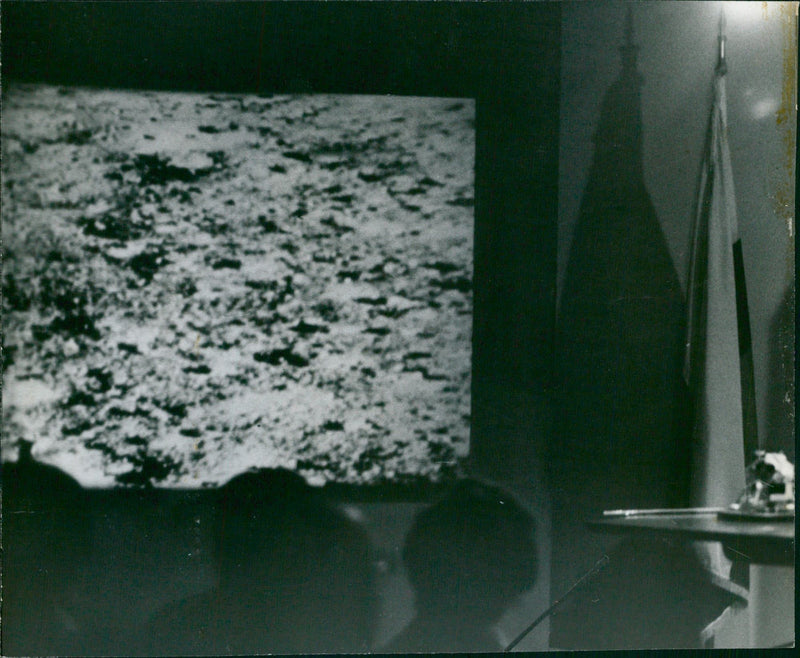 A Group of People Viewing an Image - Vintage Photograph