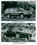 1997 Nissan Pathfinder LE and 1997 Nissan Pathfinder SE - Vintage Photograph