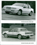 1990 Buick Skylark Custom Coupe and 1990 Buick Skylark Luxury Edition - Vintage Photograph
