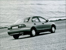 1994 Mazda 323 S - Vintage Photograph