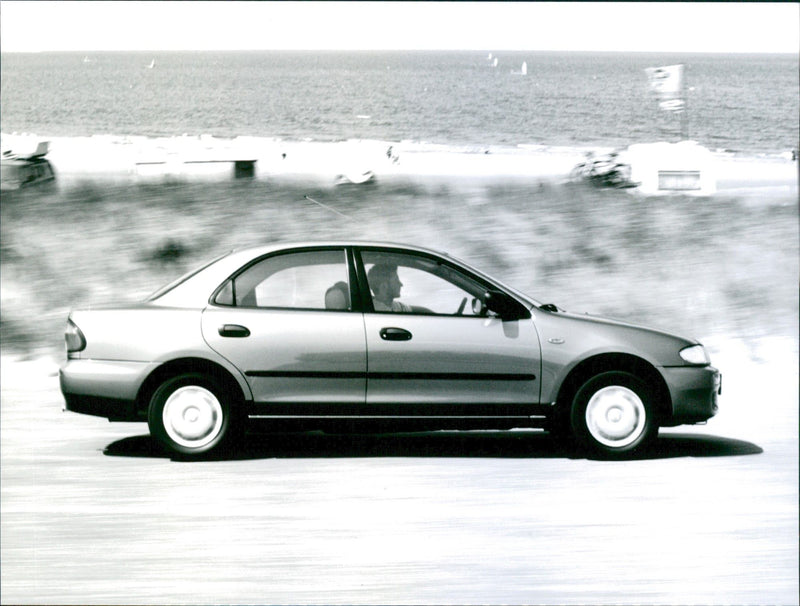 1994 Mazda 323 S - Vintage Photograph