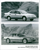 1994 Geo Prizm LSi (top) and 1994 Chevrolet Beretta Z26 (bottom) - Vintage Photograph
