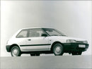 1989 Mazda 323 Hatchback - Vintage Photograph