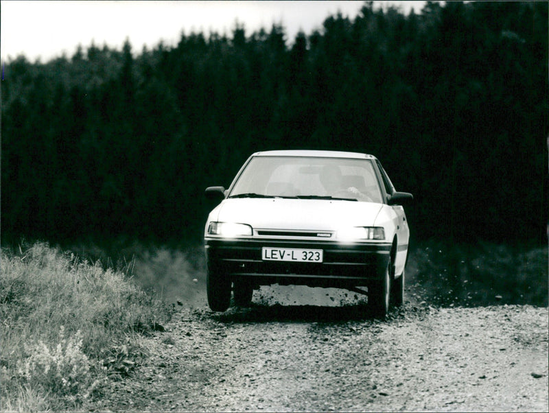 1989 Mazda 323 - Vintage Photograph