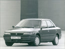 1993 Mazda 323 - Vintage Photograph