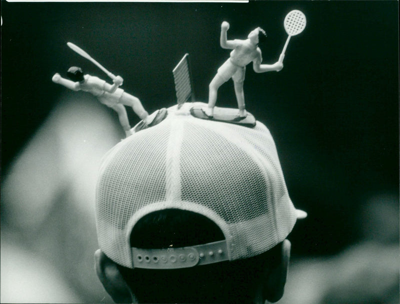 Tennis fan with model tennis players on his hat - Vintage Photograph