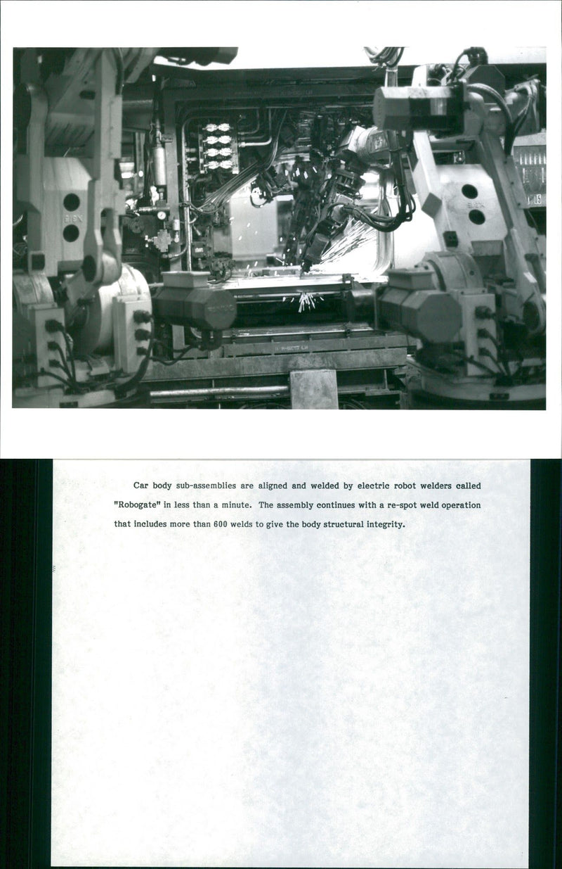105 Car body sub - assemblies are aligned and welded by electric robot welders c - Vintage Photograph