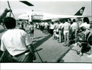 Lufthansa Jumbo becomes "telephone booth" - Vintage Photograph
