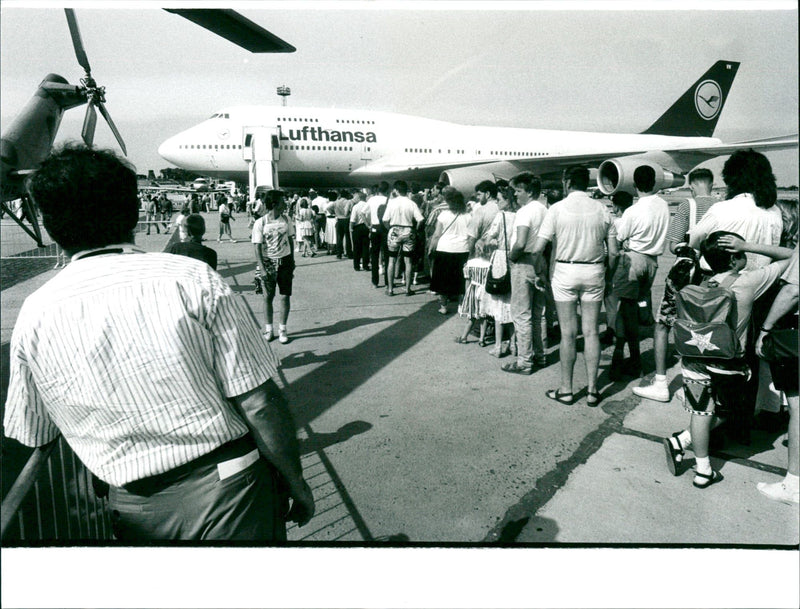 Lufthansa Jumbo becomes "telephone booth" - Vintage Photograph