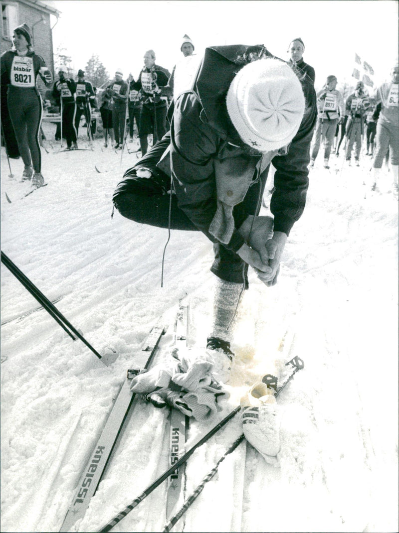 A skier freezes on his foot. Vasaloppet 1984 - Vintage Photograph