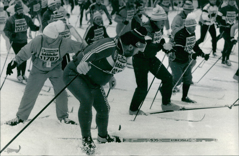 Vasaloppet 1988. Berndt Enning from West Germany in a sprint suit and behind is Joakim Sjöström in overalls - Vintage Photograph