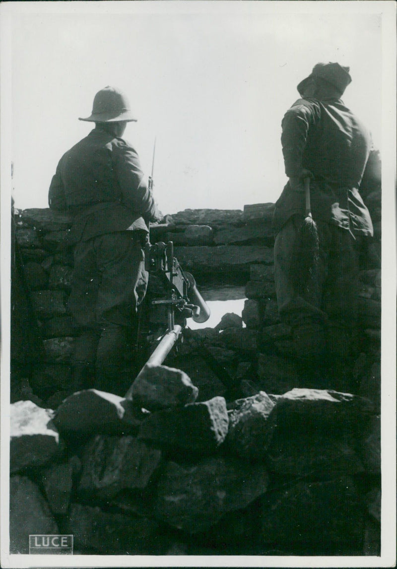 Soldiers at Defense Barrier During WWII - Vintage Photograph