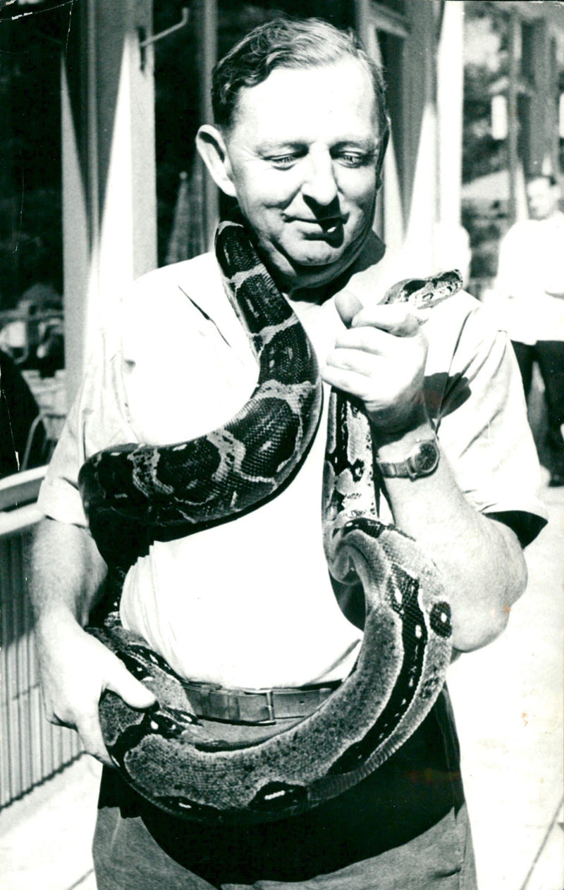 Zookeeper with a snake - Vintage Photograph