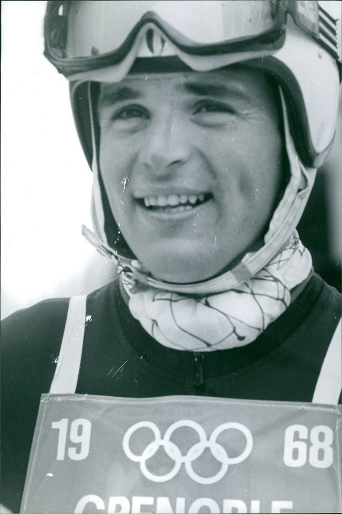 Karl Schranz smiling during 1968 Olympics. - Vintage Photograph