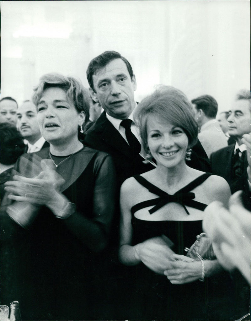 Simone Signoret with husband Yves Montand. - Vintage Photograph