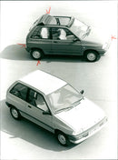 1990 MAZDA ELECTRICALLY OPERATED SLIDING ROOT PICTURE ABOVE CONQUERS - Vintage Photograph