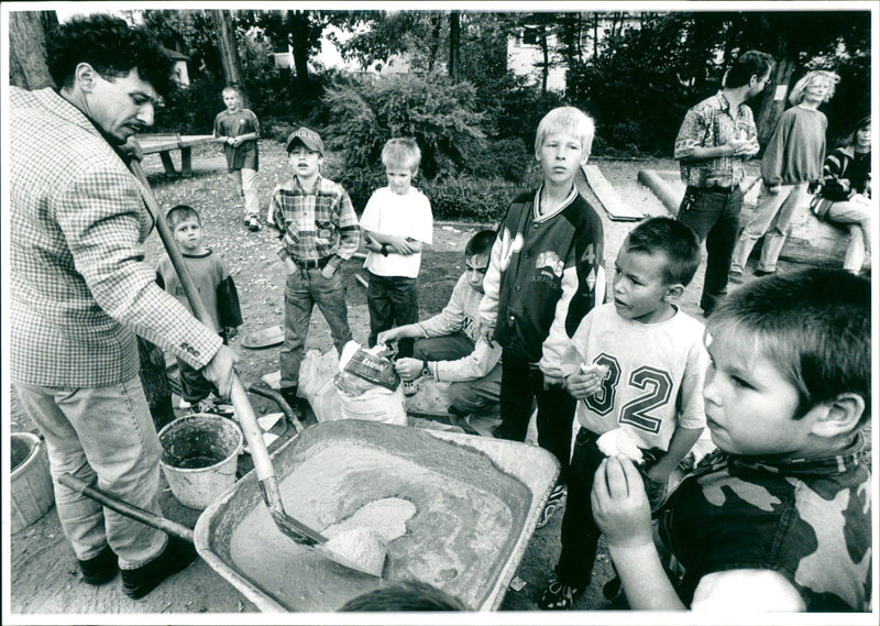 AROUND VOLUNTEERS AND HELPERS ASSISTED REMODELING - Vintage Photograph