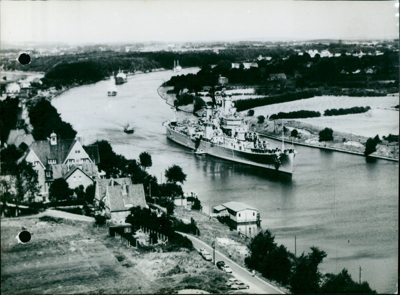 A cruiser in a canal. - Vintage Photograph