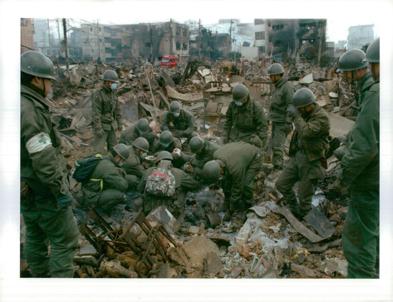 Disaster search and rescue in Japan. - Vintage Photograph