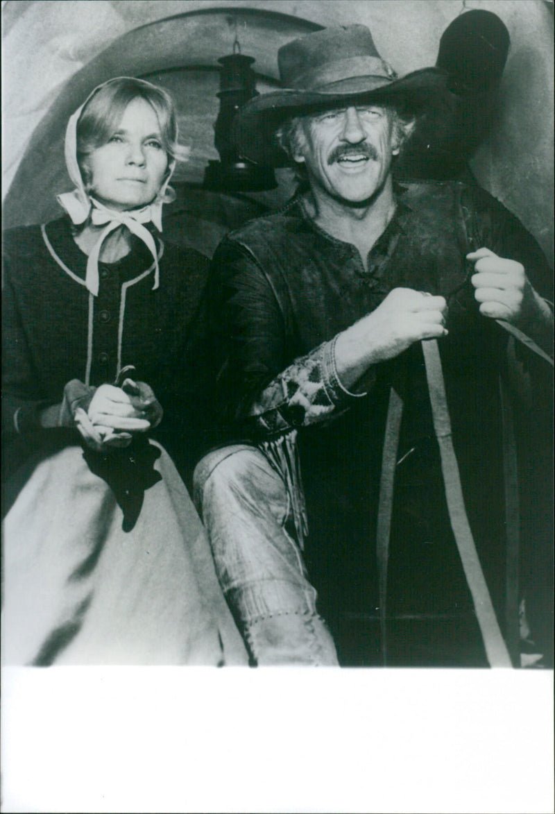 James Arness and Eva Marie Saint star in the 1976 western film, "The Macahans," on German TV on January 6, 1996. - Vintage Photograph