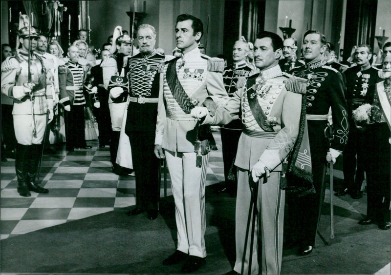 Stewart Granger is crowned as the false king of Ruritania in the 1952 film "The Prisoner of Zenda". - Vintage Photograph