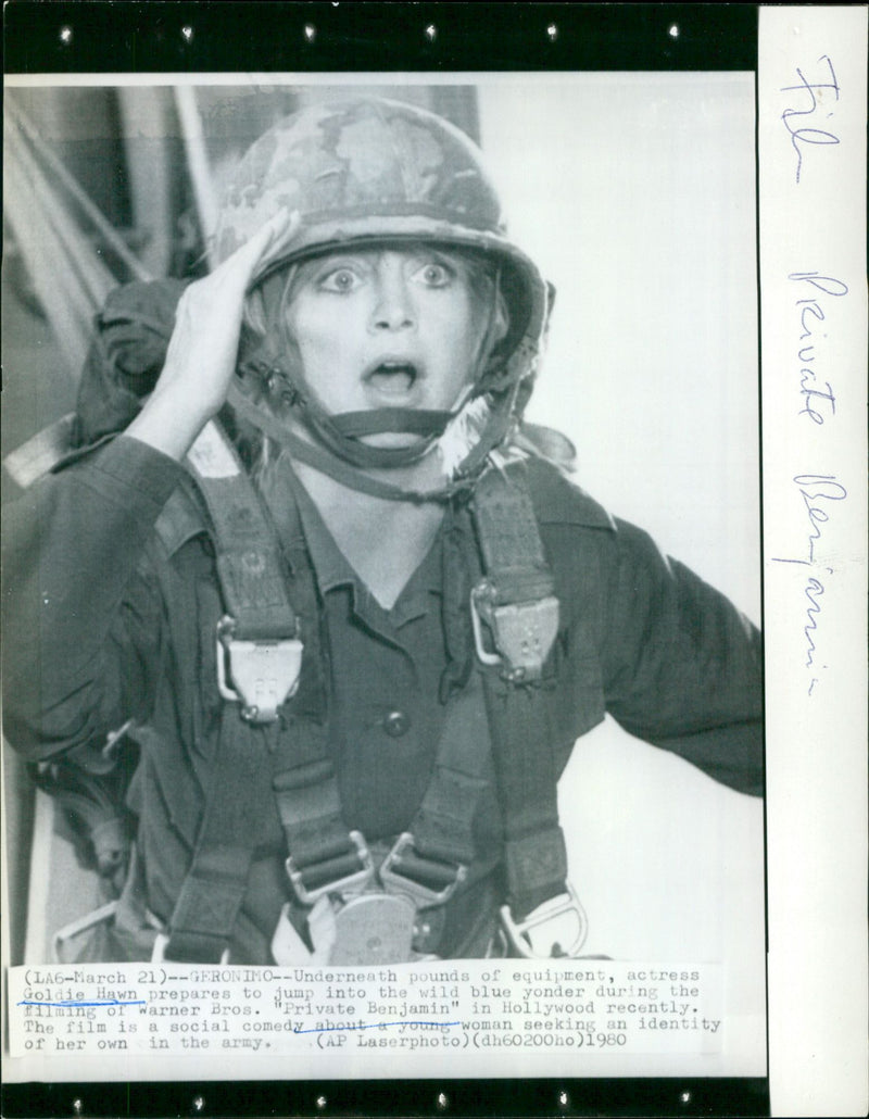 Actress Goldie Hawn prepares to skydive while filming "Private Benjamin" in Hollywood. - Vintage Photograph