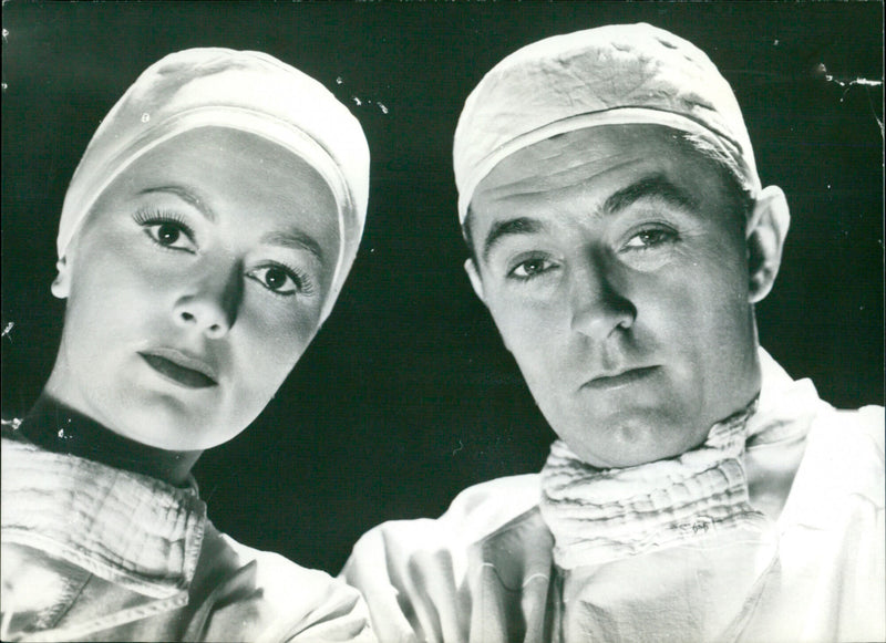 Olivia de Havilland and Robert Mitchum - Vintage Photograph