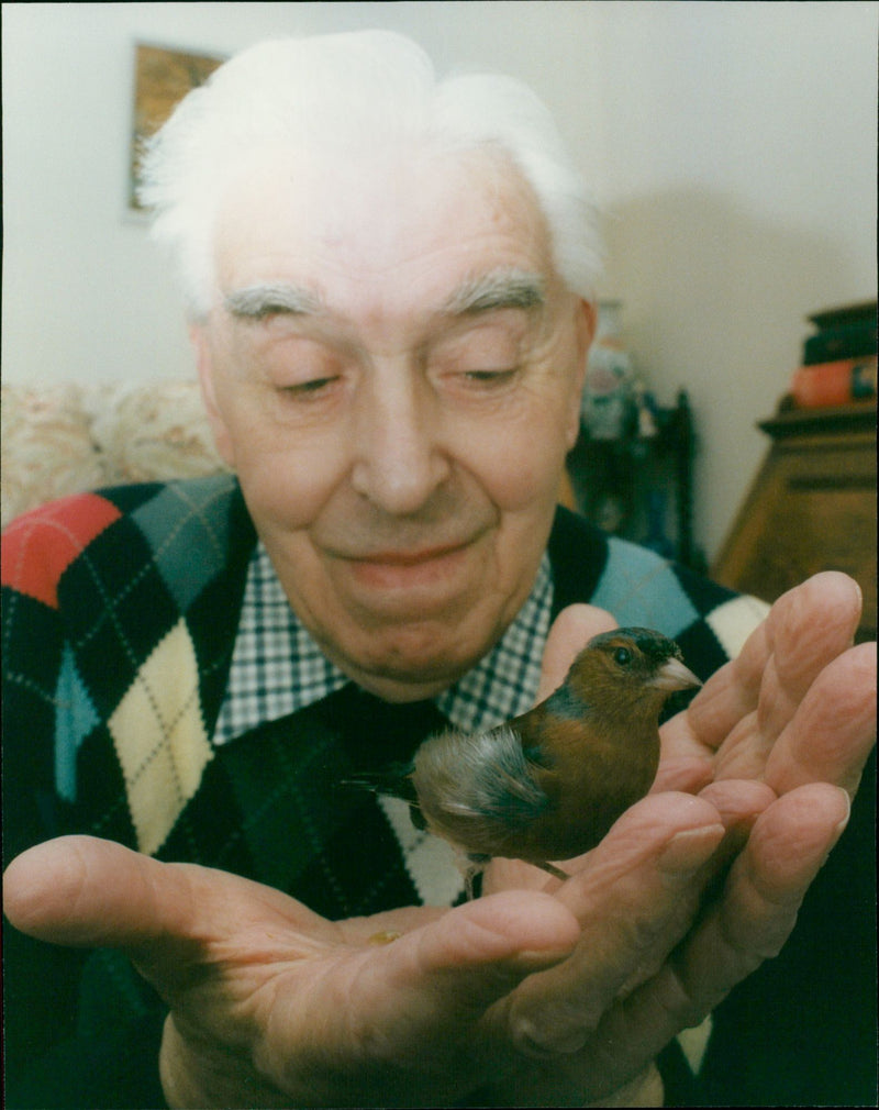 Wilfred Belcher Holding a Chaffinch - Vintage Photograph