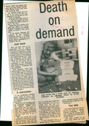 Jean Davies with a poster from the American conference she addressed/ - Vintage Photograph