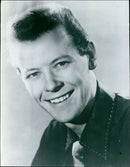 Model Craig Douglas posing in a studio - Vintage Photograph